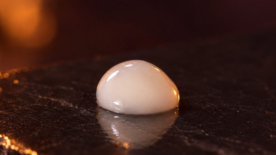 A milky white bead of Retinol and Peptide Serum